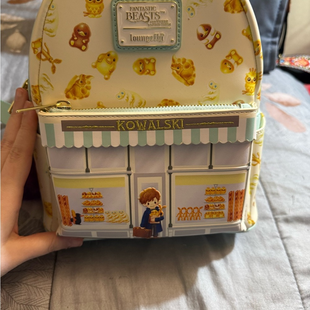 Loungefly Fantastic Beasts Kowalski Bakery Kids Backpack - White and Yellow
